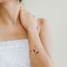 A Flower Grows Tattoo