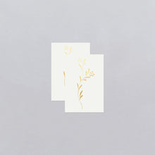 Gold Wildflower Tattoo