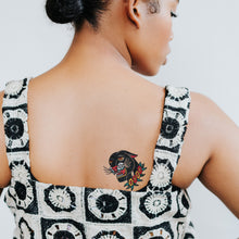 Grinning Panther Tattoo