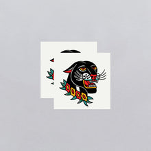 Grinning Panther Tattoo